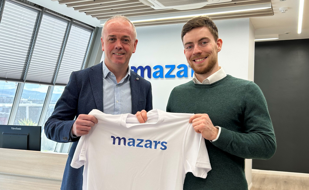 Mazars Managing Partner, Tom O’Brien, presenting IT Audit Trainee Ciarán Scanlon with some new kit before he leaves for Japan.